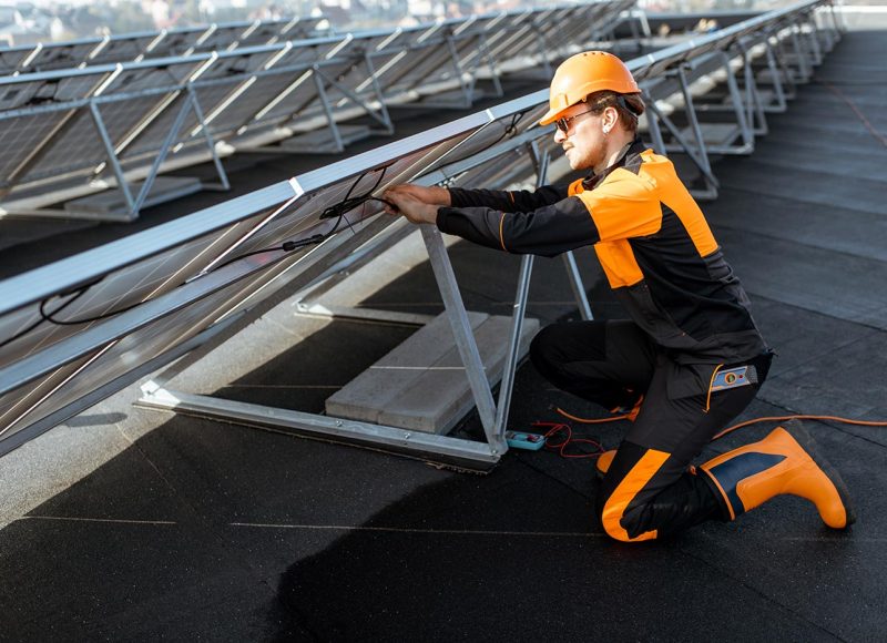 electrician-connecting-solar-panels-2021-09-02-01-01-24-utc.jpg